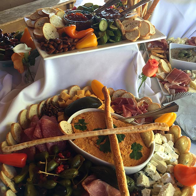 Delectable appetizers at the antipasto table for a catered event by Casa Nova Custom Catering, Santa Fe, NM