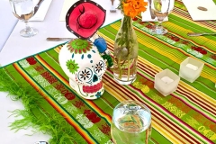 Day of the Dead table decor for Dia de los Muertos celebration catered by Casa Nova Custom Catering, Santa Fe, New Mexico