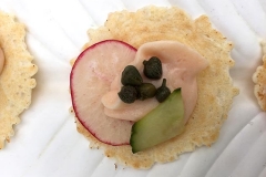 Salmon mousse and thin-sliced radish on cracker, appetizers by Casa Nova Custom Catering, Santa Fe, NM